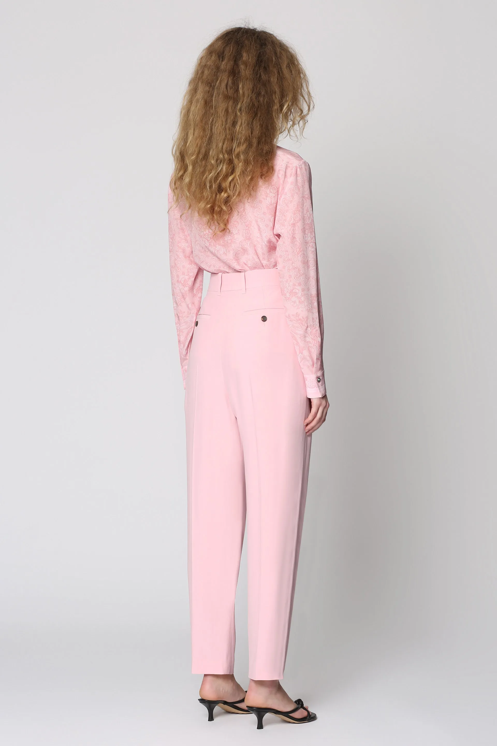 Straight-leg pants by Alexander McQueen.